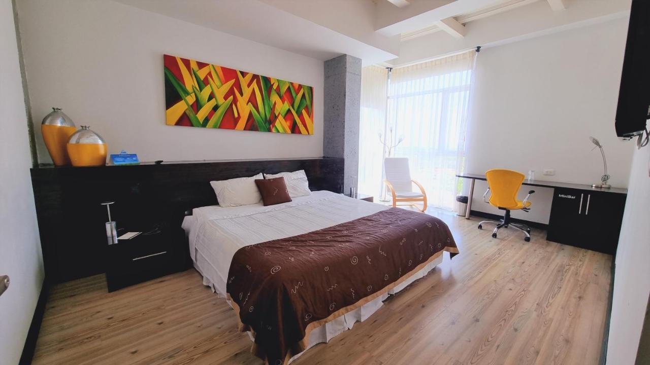 Habitat Suites Hotel Pereira Bagian luar foto