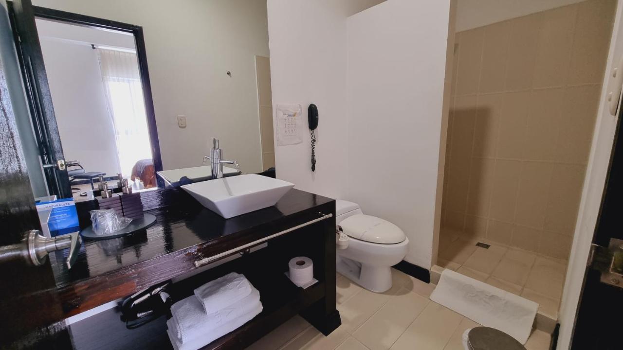 Habitat Suites Hotel Pereira Bagian luar foto