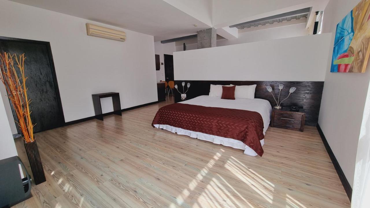 Habitat Suites Hotel Pereira Bagian luar foto