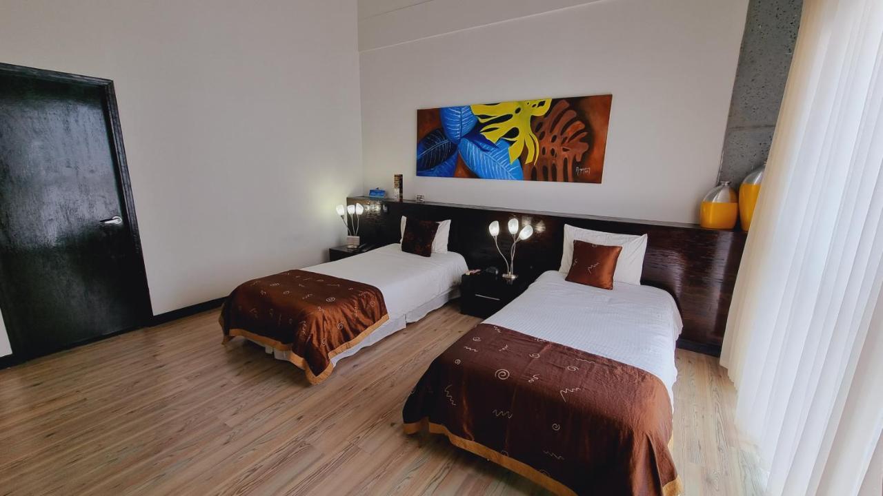 Habitat Suites Hotel Pereira Bagian luar foto